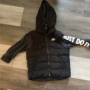 Nike Black Jacket with Zipper. Jacket says size 6/7